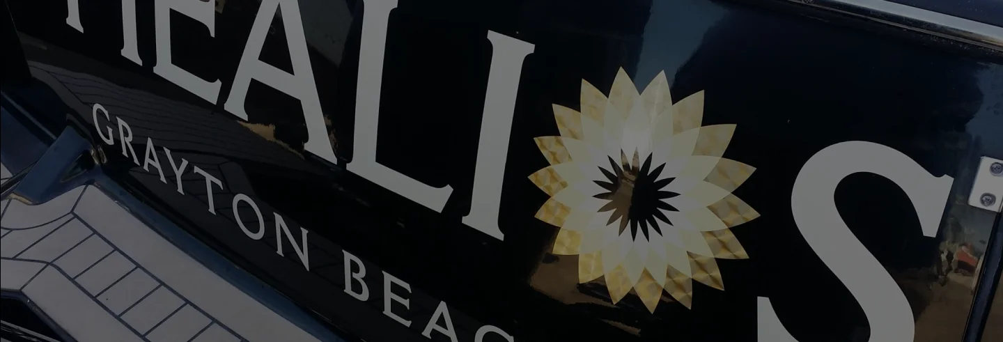 Grayton Beach logo on boat hull