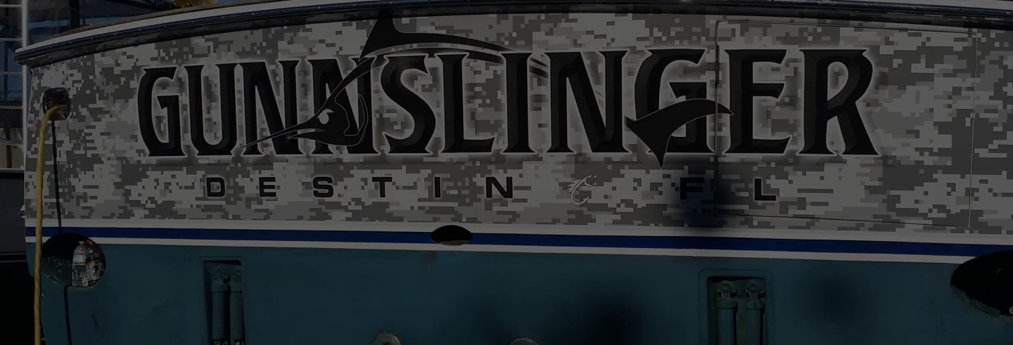 Gunslinger lettering engraved on the boat