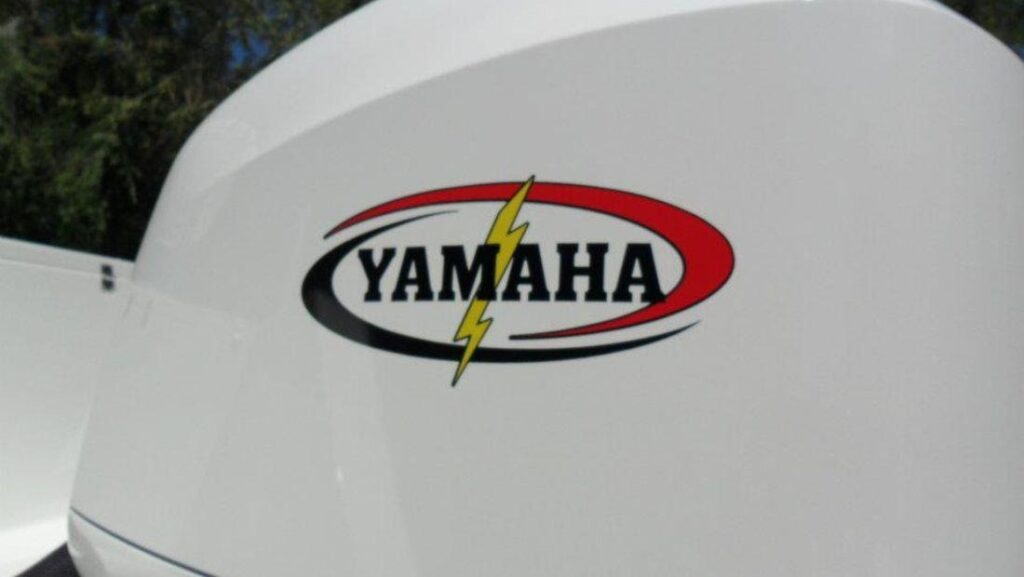 Marine vinyl boat wrap with Yamaha logo on a clean white boat surface, showcasing a sleek and professional custom wrap design.