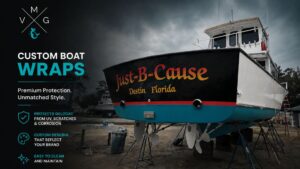 Large boat on dry land with a professional blue and black vinyl wrap, showing premium protection and custom design, emphasizing durability, style, and boat wrap cost.