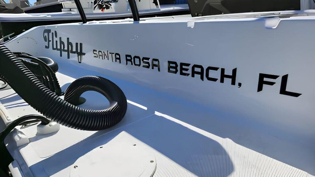 Custom boat name lettering and hull graphics in Santa Rosa Beach, Florida for marine vinyl wrap near me