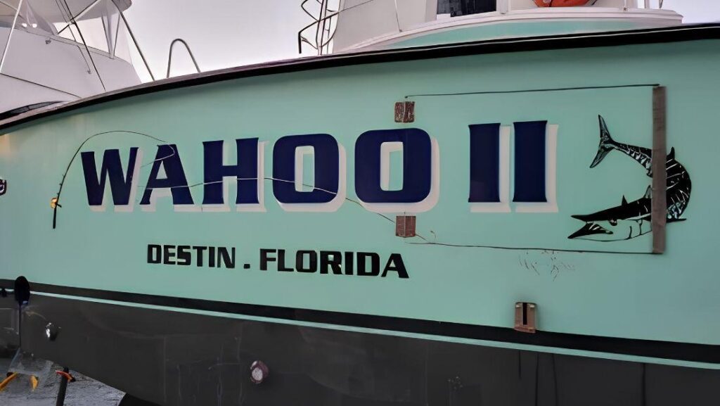 Custom sportfishing boat graphics and lettering installation in Destin, Florida for marine vinyl wrap near me
