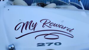 Custom boat name graphics and transom lettering installation for marine vinyl wrap near me in Florida