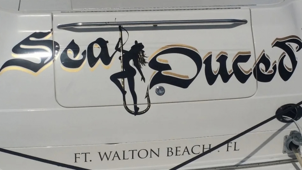 Custom Sea Duce boat name lettering across a yacht transom